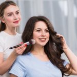 female-visagiste-doing-makeup_23-2148113172