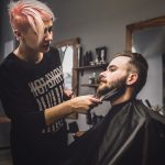 woman-grooming-beard-stylish-client_23-2147737040
